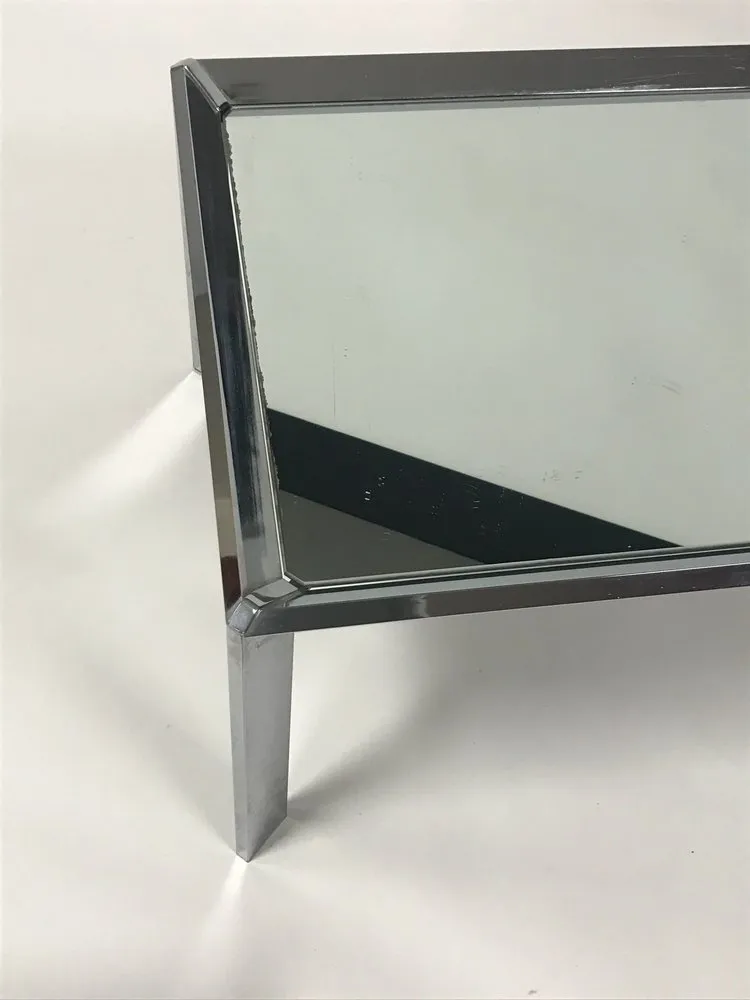 Pair of vintage mid century modern chrome tables with mirror tops in the style of Milo Baughman