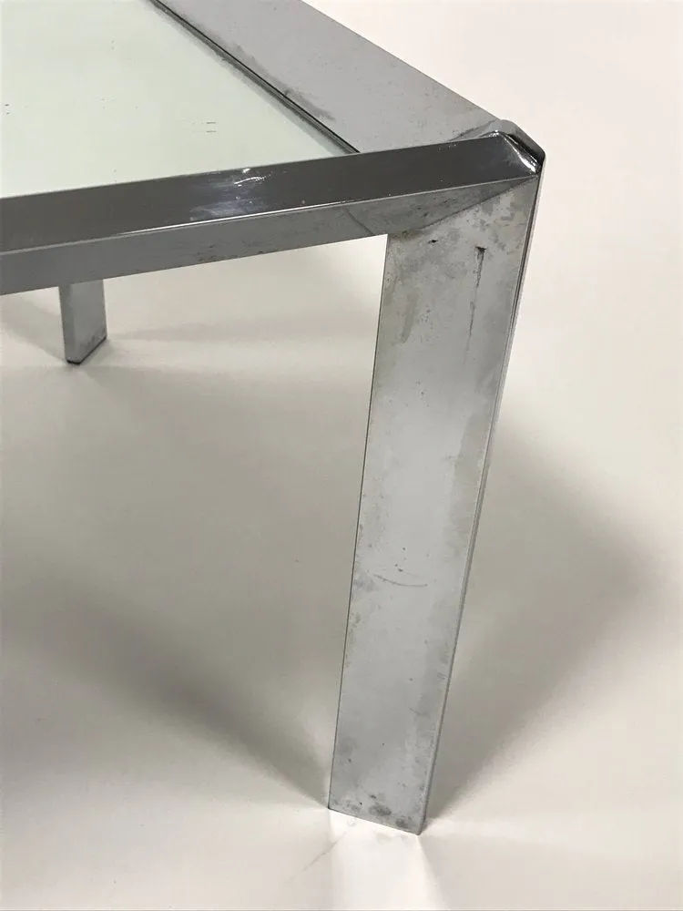 Pair of vintage mid century modern chrome tables with mirror tops in the style of Milo Baughman