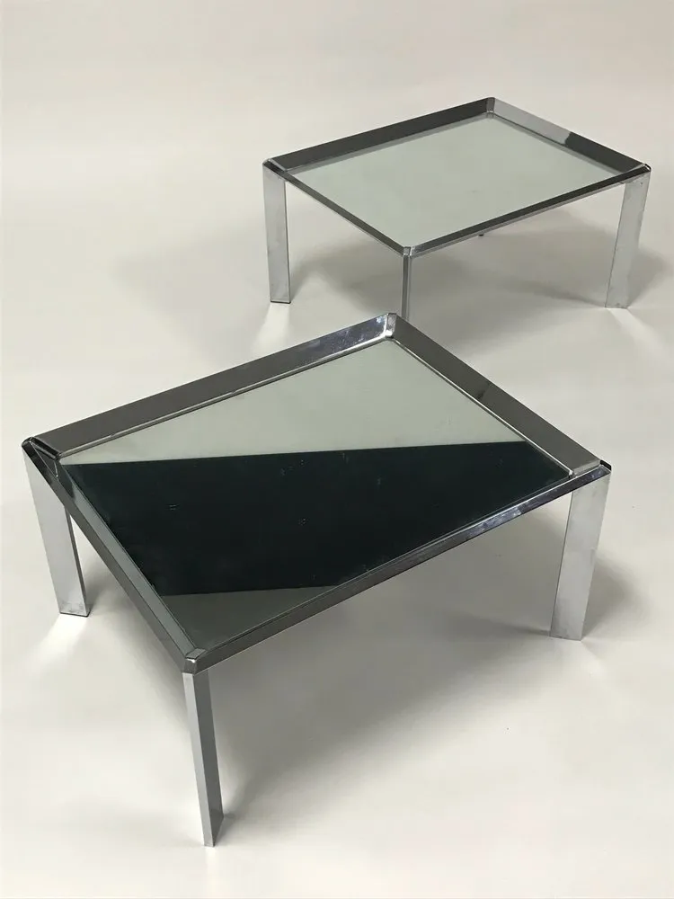 Pair of vintage mid century modern chrome tables with mirror tops in the style of Milo Baughman